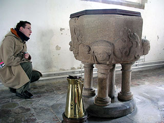 Ben admires the extraordinary font at Witcham