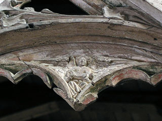 an angel in the spandrel of the rood screen