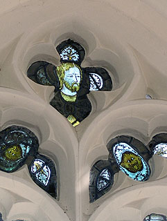 top of one of the chancel windows - a surviving christ