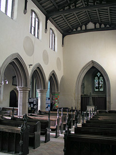 the nave looking west - note the obsolete circular clerestory holes
